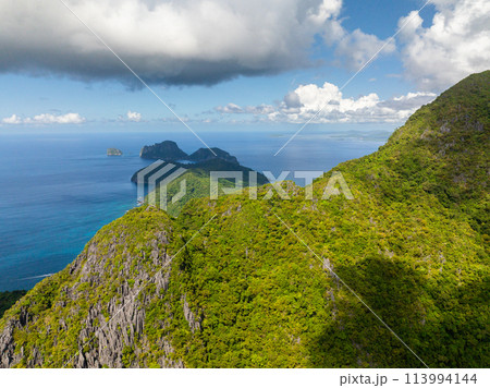 Limestone rock formation over the mountain in Cadlao Island. El Nido, Palawan. Philippines. Limestone rock formation over the mountain in Cadlao Island. El Nido, Palawan. Philippines. 113994144