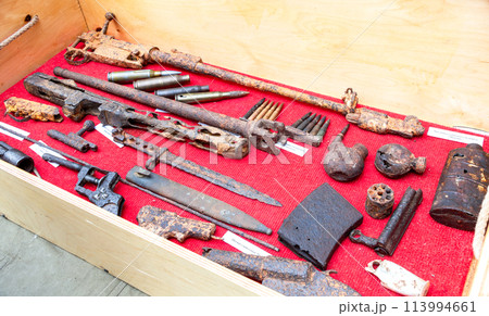 Rusty remains of weapons and ammunition from the Second World War 113994661