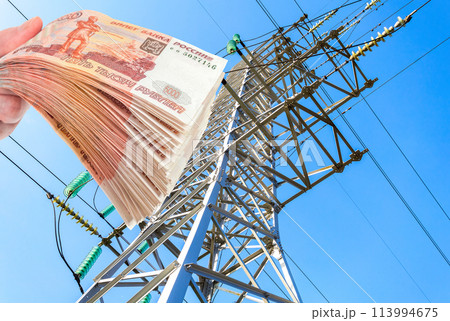 High voltage electric tower against the blue sky. Power transmission line 113994675