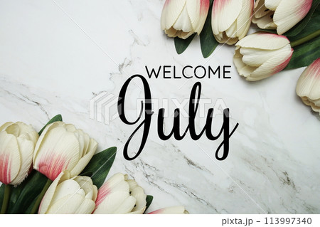 Welcome July text with Tulip flower borderの写真素材