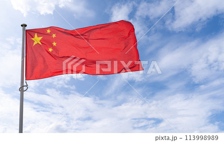 Chinese flag is waving in wind. China symbol Chinese flag is waving in wind. China symbol 113998989