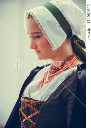 Portrait of brunette woman dressed in historical Baroque clothes Portrait of brunette woman dressed in historical Baroque clothes 114001640