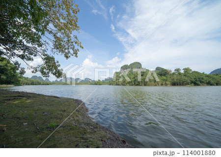 Clear blue turquoise seawater, Andaman sea in Phuket island in summer season, Thailand. Water in ocean pattern wallpaper background. Clear blue turquoise seawater, Andaman sea in Phuket island in summer season, Thailand. Water in ocean pattern wallpaper background. 114001880