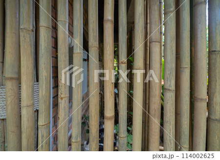 Natural wood slats wall or lath line arrange. Flooring pattern surface texture. Close-up of interior architecture material for design decoration background. 114002625