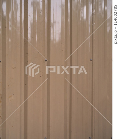 Metal steel strips. Rusty corrugated iron metal, Zinc steel wall, pattern texture background. Close-up of exterior architecture material for design decoration background. Metal steel strips. Rusty corrugated iron metal, Zinc steel wall, pattern texture background. Close-up of exterior architecture material for design decoration background. 114002785