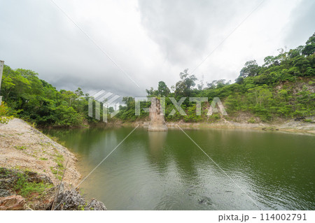 Ground in the land with sand in factory industry for construction site. Arid pattern texture background. Bulldozer tractor 114002791