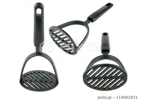 Kitchen utensils, potato masher isolated on white. Collage. There is free space for text. Kitchen utensils, potato masher isolated on white. Collage. There is free space for text. 114002831