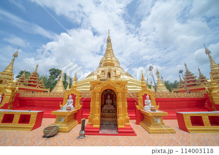 The Isan pagoda is a buddhist temple near Bangkok, an urban city town, Thailand. Thai architecture landscape background. Tourist attraction landmark. 114003118