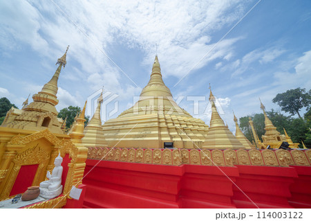 The Isan pagoda is a buddhist temple near Bangkok, an urban city town, Thailand. Thai architecture landscape background. Tourist attraction landmark. The Isan pagoda is a buddhist temple near Bangkok, an urban city town, Thailand. Thai architecture landscape background. Tourist attraction landmark. 114003122