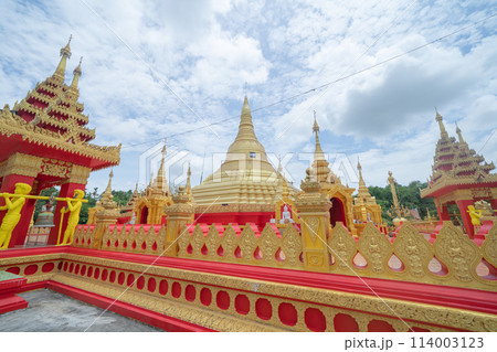 The Isan pagoda is a buddhist temple near Bangkok, an urban city town, Thailand. Thai architecture landscape background. Tourist attraction landmark. 114003123
