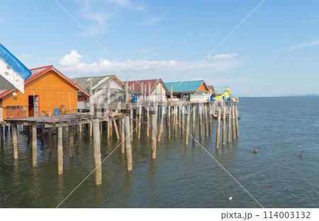 Koh Panyee, The Floating village urban city town houses, lake sea or river. Nature landscape fisheries and fishing tools at Pak Pha, Phang Nga, Thailand. Aquaculture farming 114003132