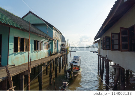 Koh Panyee, The Floating village urban city town houses, lake sea or river. Nature landscape fisheries and fishing tools at Pak Pha, Phang Nga, Thailand. Aquaculture farming Koh Panyee, The Floating village urban city town houses, lake sea or river. Nature landscape fisheries and fishing tools at Pak Pha, Phang Nga, Thailand. Aquaculture farming 114003138