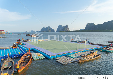 Koh Panyee, The Floating village urban city town houses, lake sea or river. Nature landscape fisheries and fishing tools at Pak Pha, Phang Nga, Thailand. Aquaculture farming Koh Panyee, The Floating village urban city town houses, lake sea or river. Nature landscape fisheries and fishing tools at Pak Pha, Phang Nga, Thailand. Aquaculture farming 114003151