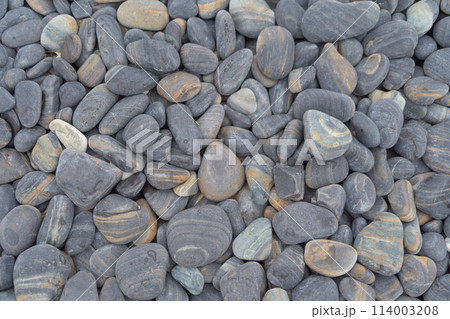 Granite gravel stone rocks flooring pattern surface texture. Close-up of exterior material for design decoration background. Rubble Granite gravel stone rocks flooring pattern surface texture. Close-up of exterior material for design decoration background. Rubble 114003208