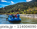 Punakha, Bhutan - Tourists ride on the rafting facility, providing an interesting experience for travel enthusiasts 114004090