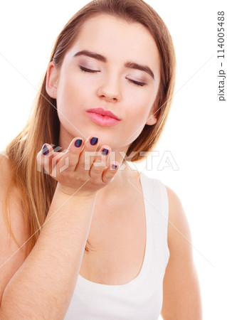 Teenager woman sending air kisses, love gesture Teenager woman sending air kisses, love gesture 114005488