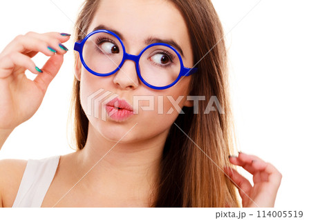 Nerdy woman showing making funny face 114005519