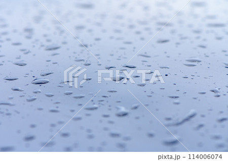Rain drops on windshield Rain drops on windshield 114006074