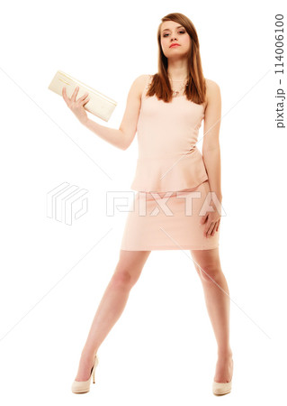 Elegance. Full length of girl in pink dress and with handbag 114006100