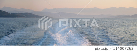 Beautiful sea during summer holidays. Back view from the yacht on a sunny day. Saronic Gulf, Greece. High quality photo Beautiful sea during summer holidays. Back view from the yacht on a sunny day. Saronic Gulf, Greece. High quality photo 114007262