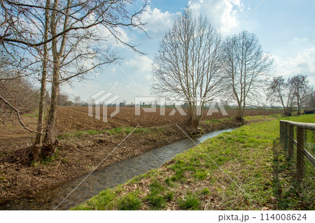 Plowed agricultural field 114008624