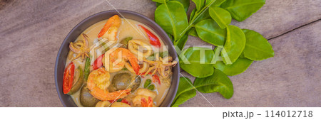 Thai food chicken green curry on dark wooden background. top view BANNER, LONG FORMAT 114012718
