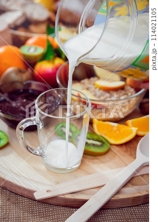 Beautiful breakfast. Milk fruits, bread and croissant. Beautiful breakfast. Milk fruits, bread and croissant. 114021105