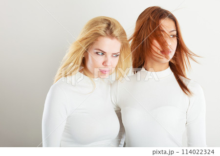 Two young friends together. 114022324