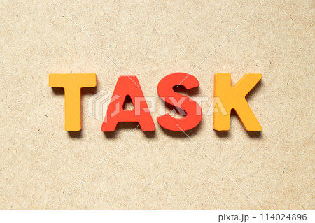 Color alphabet letter in word task on wood background 114024896