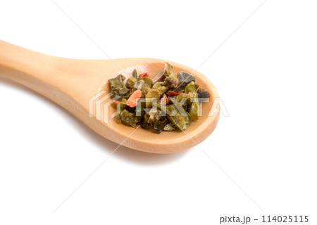 wooden spoon filled with spices isolated on the white 114025115