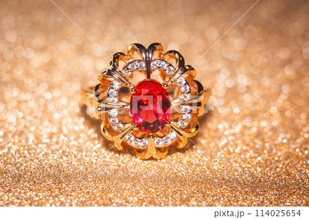 Gold ring with ruby and zirconia 114025654