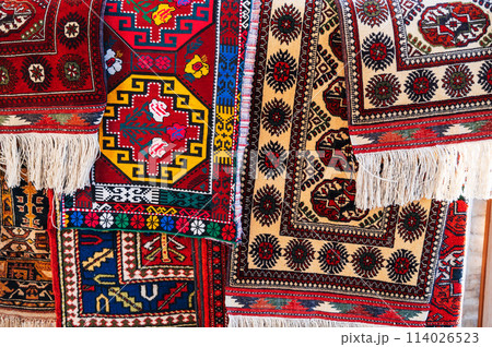modern oriental Arabic carpets on oriental bazaar in Uzbekistan 114026523