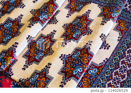 Colorful expensive modern oriental Arabic carpet on market in Tashkent in Uzbekistan Colorful expensive modern oriental Arabic carpet on market in Tashkent in Uzbekistan 114026529
