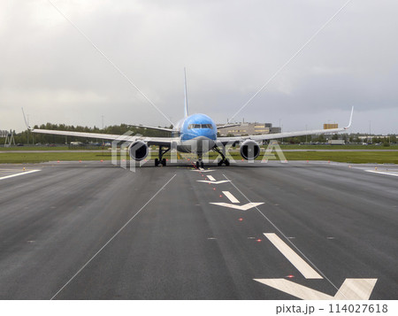 airplaine on take off runway airstrip in Schipol Airport airplaine on take off runway airstrip in Schipol Airport 114027618