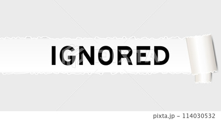 Ripped gray paper background that have word ignored under torn part 114030532