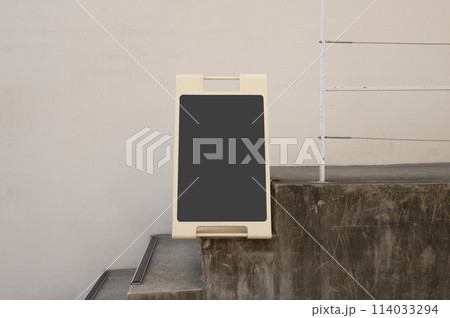 Large blank billboard on a street wall, banners with room to add your own text Large blank billboard on a street wall, banners with room to add your own text 114033294