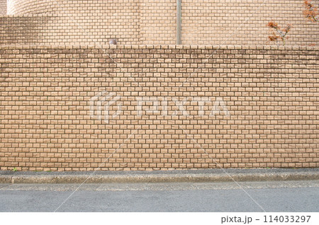 street wall background ,Industrial background, empty grunge urban street with warehouse brick wall 114033297