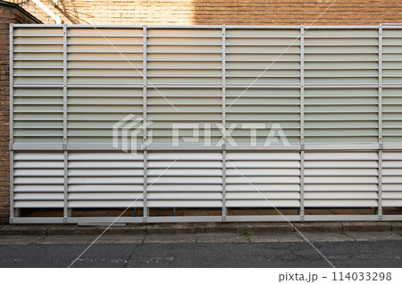 street wall background ,Industrial background, empty grunge urban street with warehouse brick wall 114033298