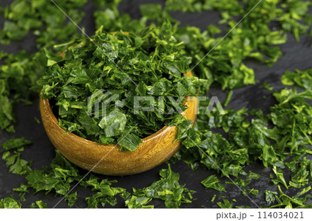 frozen for storing green spice parsley on the table frozen for storing green spice parsley on the table 114034021