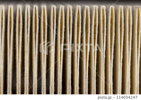 old used air filter in dirt and dust to clean the air 114034247