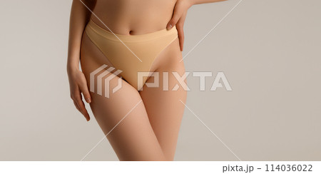 Perfect body. Slim caucasian lady posing showing Perfect body. Slim caucasian lady posing showing 114036022