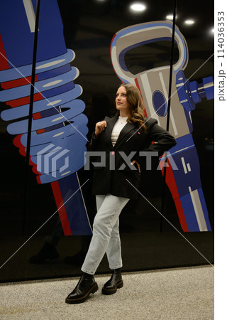 Beautiful lonely girl in black posing in the subway. Beautiful lonely girl in black posing in the subway. 114036353