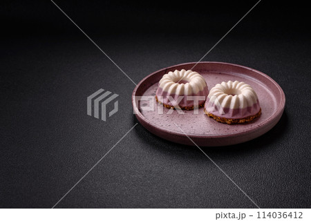 Delicious round pink and white cheesecake lactose-free, sugar-free, healthy nutrition 114036412