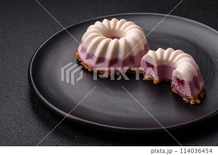 Delicious round pink and white cheesecake lactose-free, sugar-free, healthy nutrition 114036454