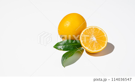 Fresh cut lemons on isolated white background with shadow and leaves 114036547