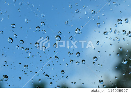 spring rain drops on car glass 1 114036997