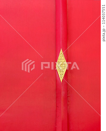Asian golden detail is  on red wooden background. Thai golden ornament. 114037551