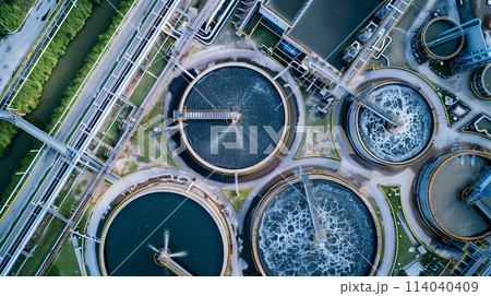 A view of a water treatment plant with three large tanks 114040409