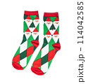 Red and green striped socks on white background 114042585