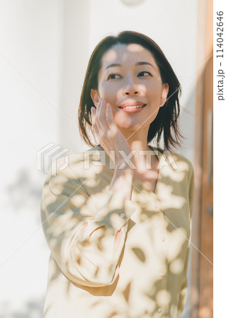 a forty-something woman a forty-something woman 114042646